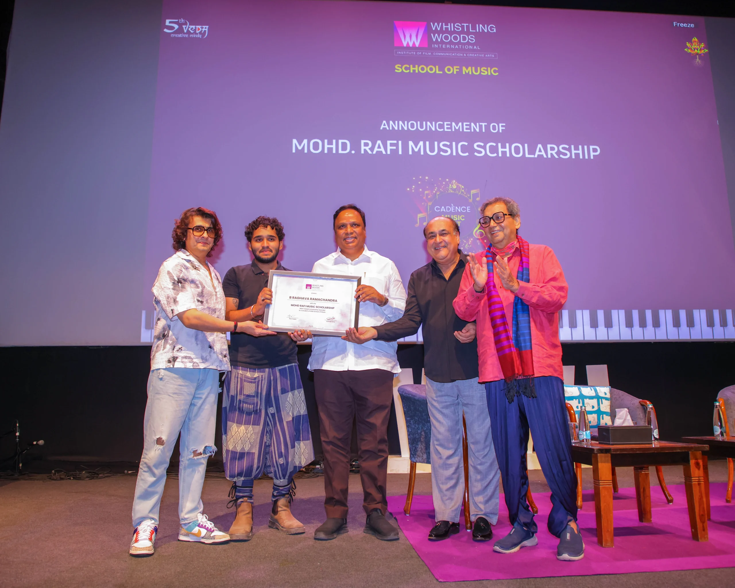 A 2nd year student presented with the Mohd Rafi Music Scholarship at the Cadence Music Festival 2025 in the esteemed presence of Shahid Rafi and Sonu Nigam along with the founder and Chairma scaled